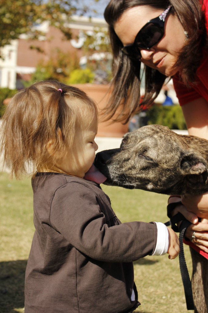 Adoptee Firecracker loves on children.